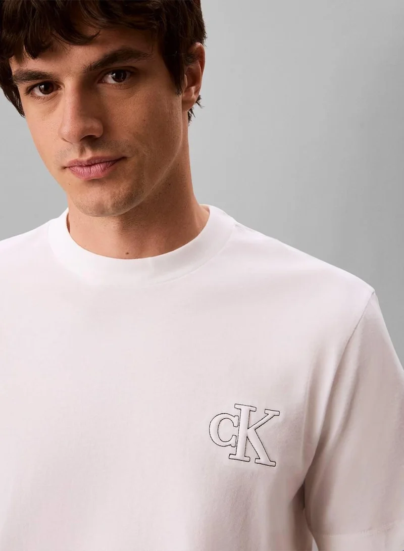 Calvin Klein Jeans Bright White Relaxed Embossed Logo T-shirt for Men | Best Price UAE