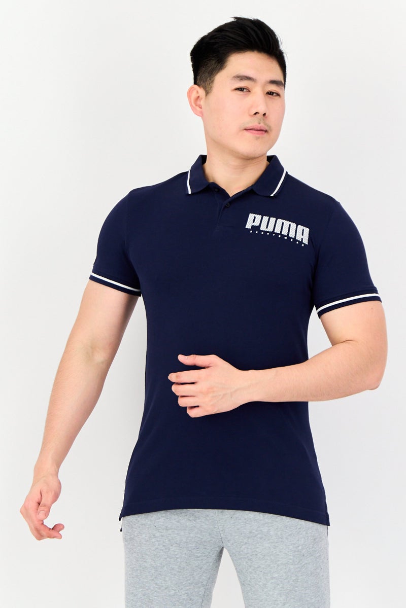PUMA Men Sportswear Fit Short Sleeve Outdoor Polo Shirt, Navy Blue - Image 1