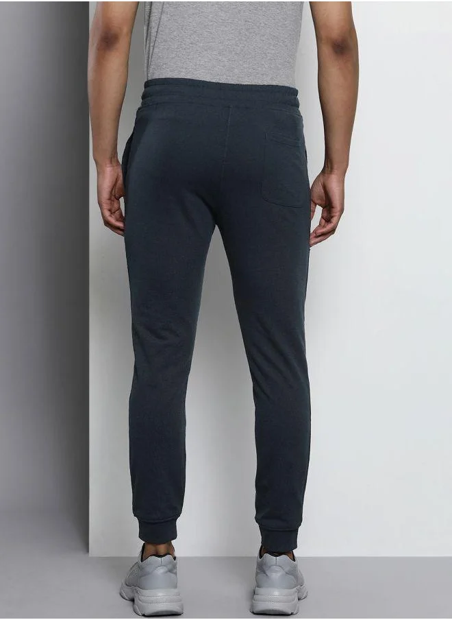 The Indian Garage Co Men Slim Fit Solid Mid-Rise Stretchable Knitted Jogger Trousers