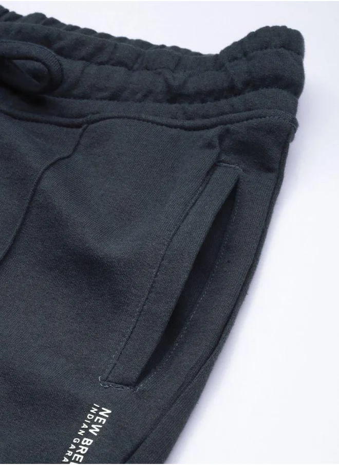 The Indian Garage Co Men Slim Fit Solid Mid-Rise Stretchable Knitted Jogger Trousers