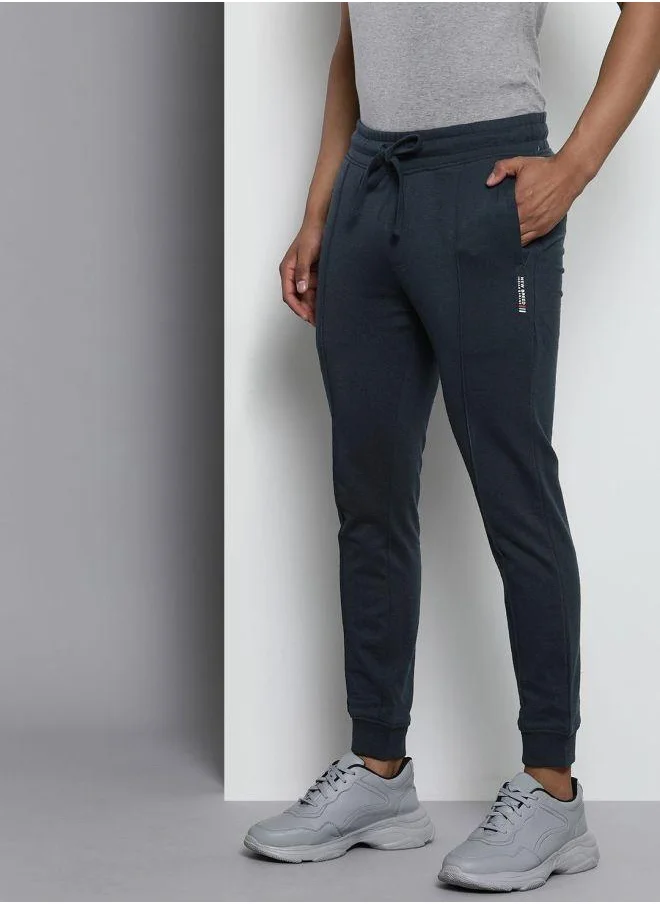 The Indian Garage Co Men Slim Fit Solid Mid-Rise Stretchable Knitted Jogger Trousers