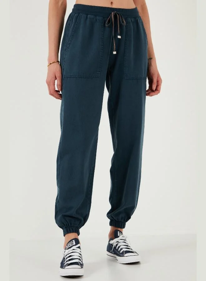 ليلا بنطلون رياضي نسائي بخصر مرتفع ورباط مطاطي عند الكاحل