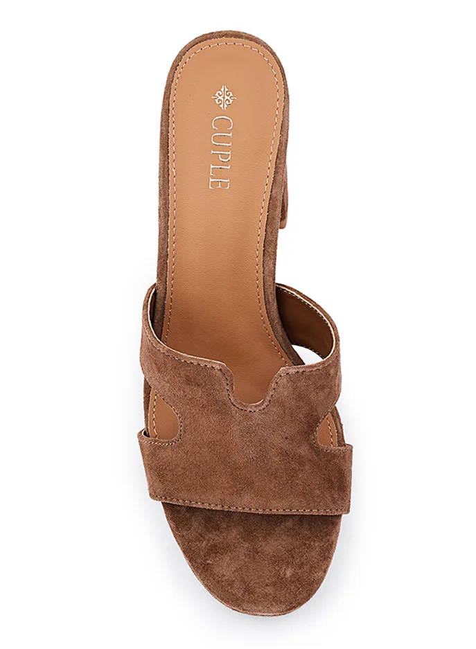 Elegant heel slippers designed for a chic look.