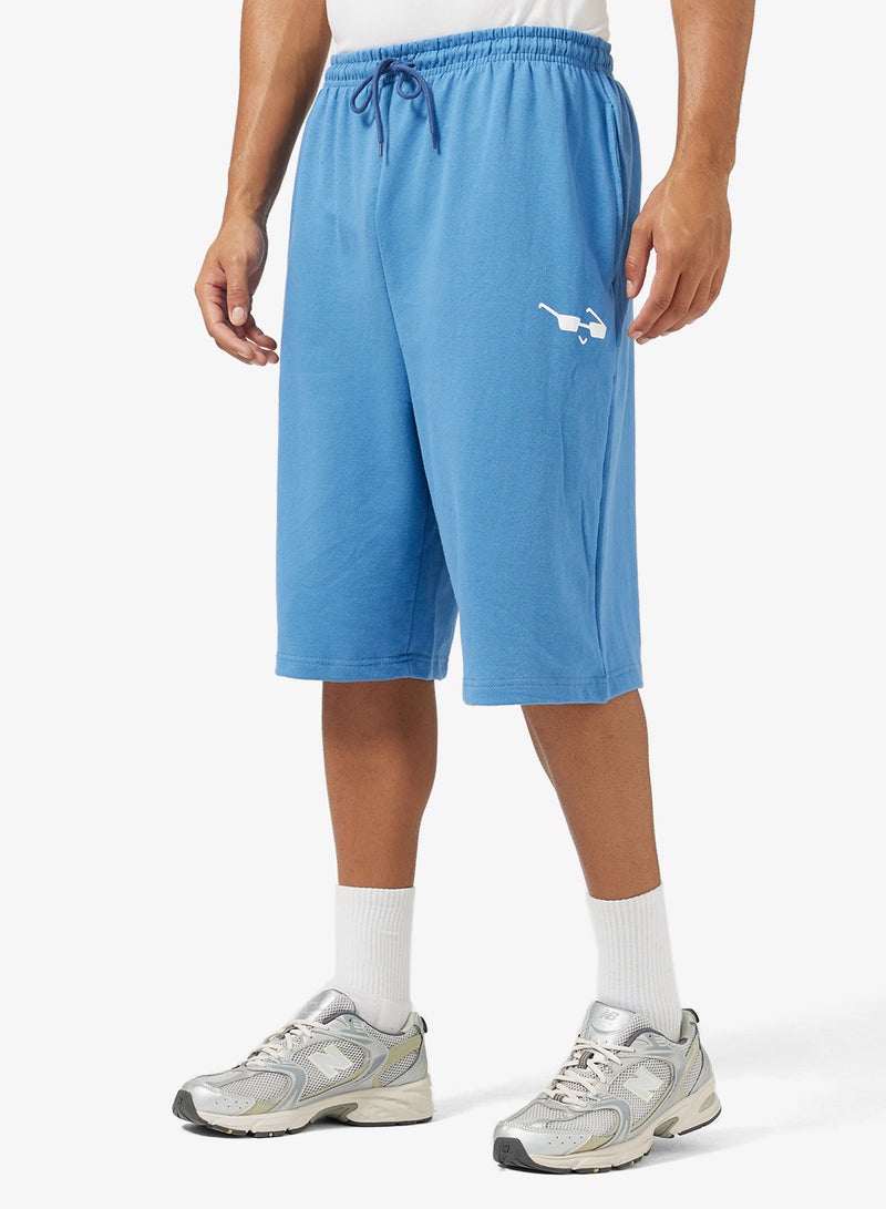 سفنتي فايف شورت واسع بطبعة جرافيك - Image 1