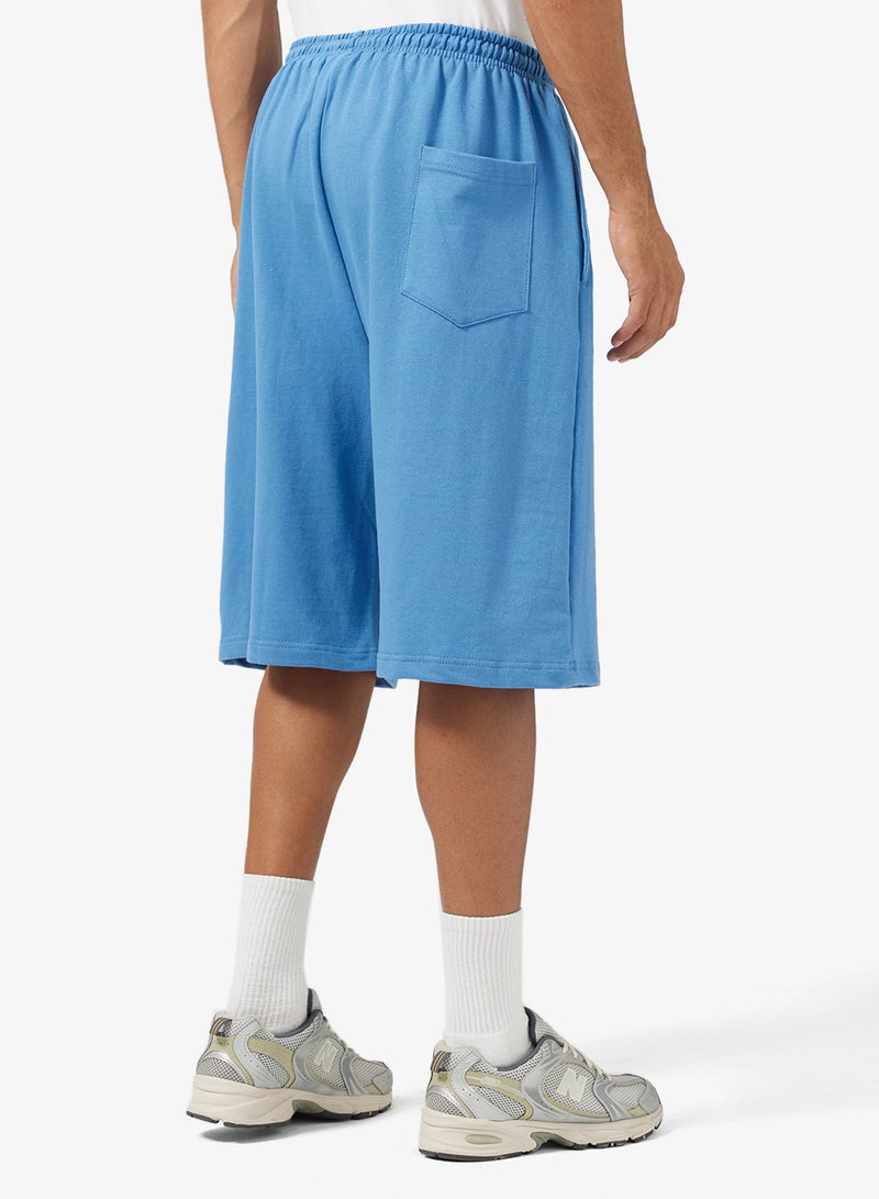 سفنتي فايف شورت واسع بطبعة جرافيك - Image 3