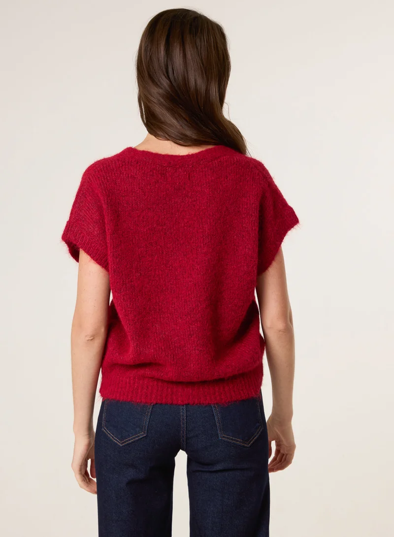 بلو فانيلا كارديجان قصير بأزرار وأكمام قصيرة