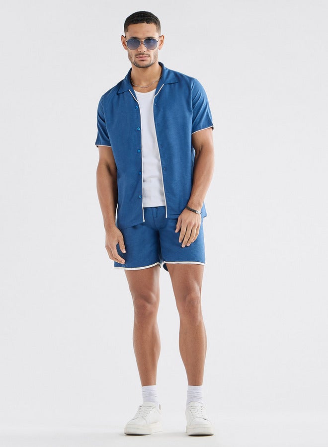 سبلاش فيڤ شورت سادة بجيوب وتفاصيل خيوط بارزة - Image 2