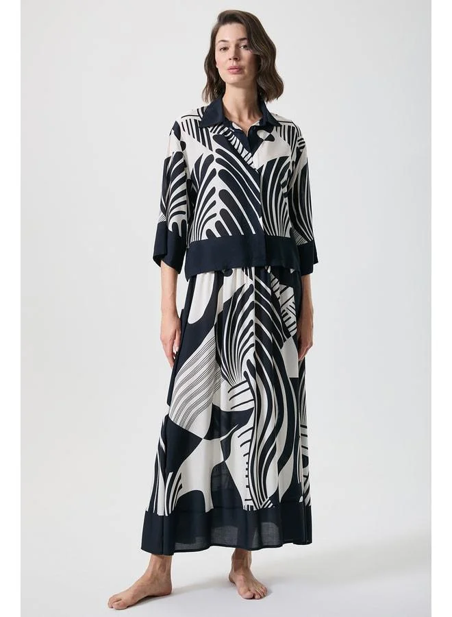 Penye Mood Zebra-Pattern Waist-Cinched Skirt and Shirt Set.