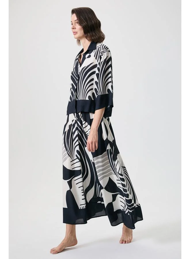 Penye Mood Zebra-Pattern Waist-Cinched Skirt and Shirt Set.