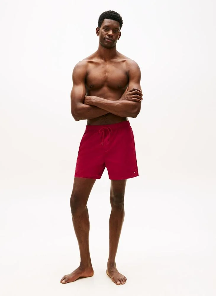 TOMMY HILFIGER  Tonal Logo Mid Length Swim Shorts for Men | Best Price UAE