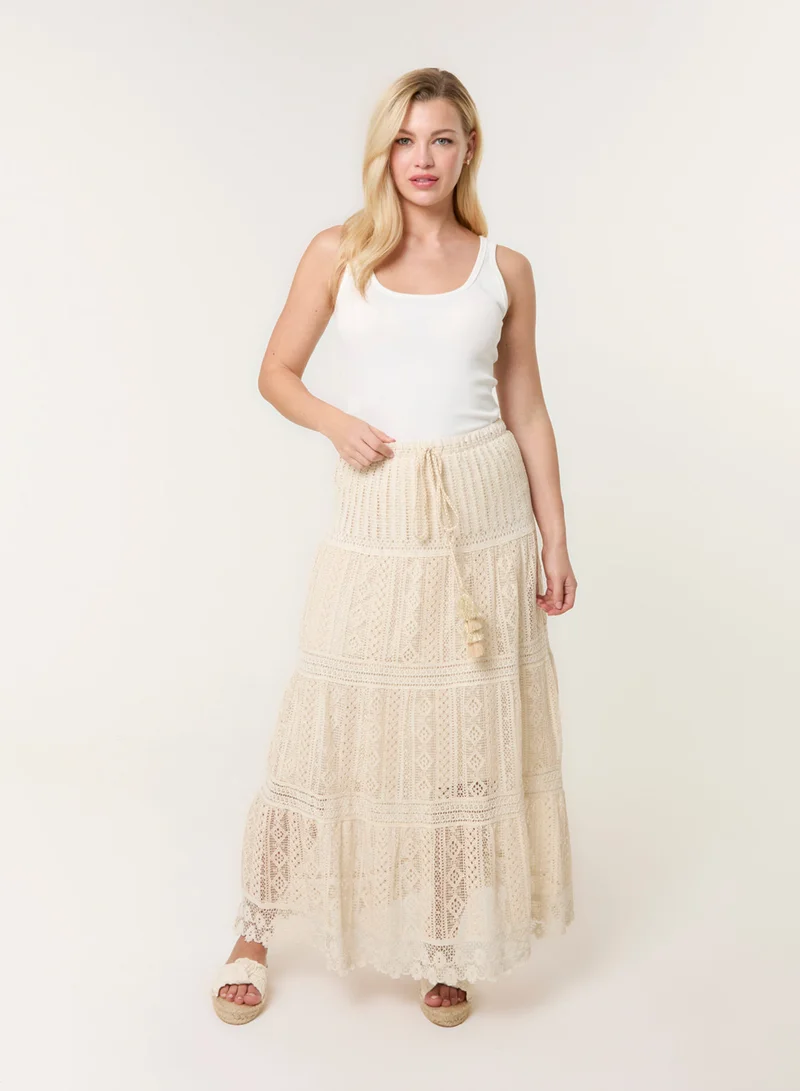 بلو فانيلا Crochet Tassel Tie Front Maxi Skirt