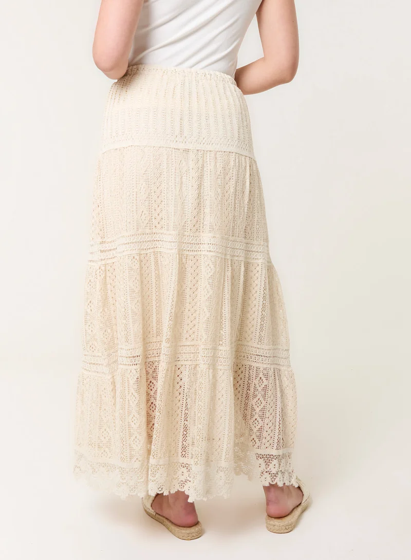 بلو فانيلا Crochet Tassel Tie Front Maxi Skirt