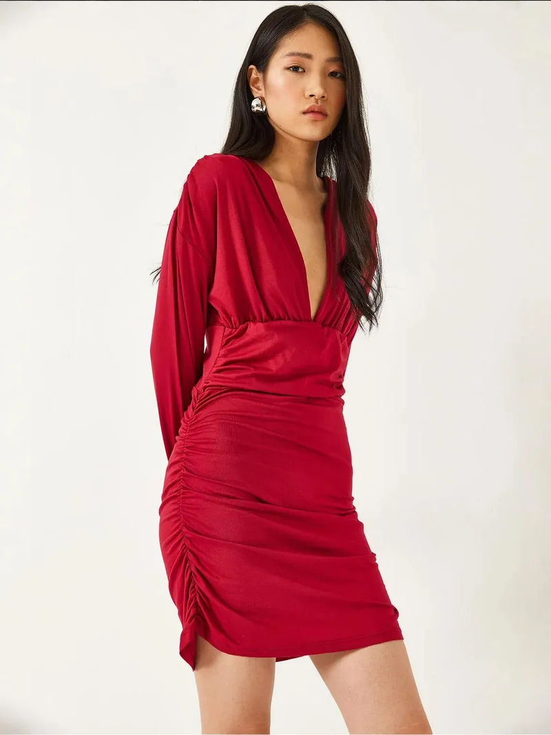 Bianco Lucci LUCCI Bodycon Mini Dress with Ruched Detail and V-Neck