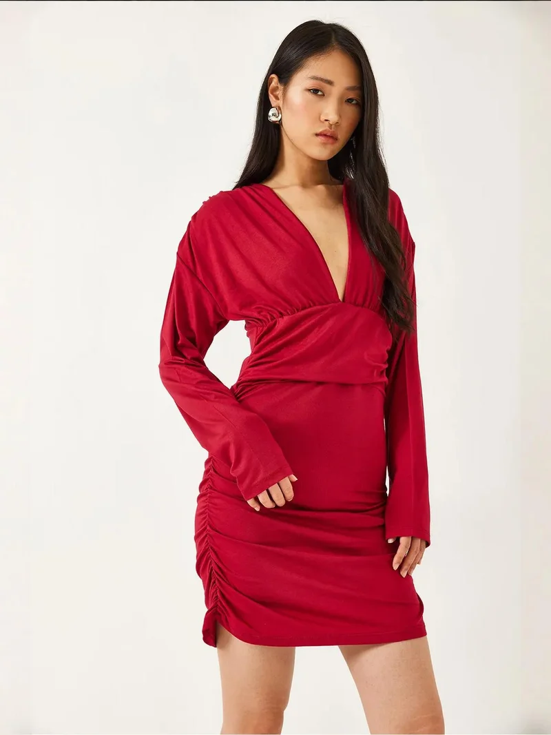 Bianco Lucci LUCCI Bodycon Mini Dress with Ruched Detail and V-Neck