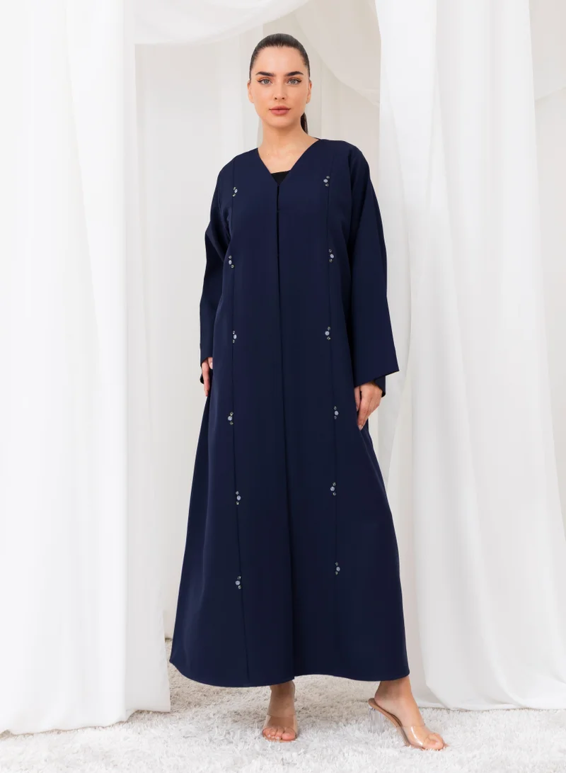 نيكياس عباية كريب زرقاء داكنة مع تطريز خرز