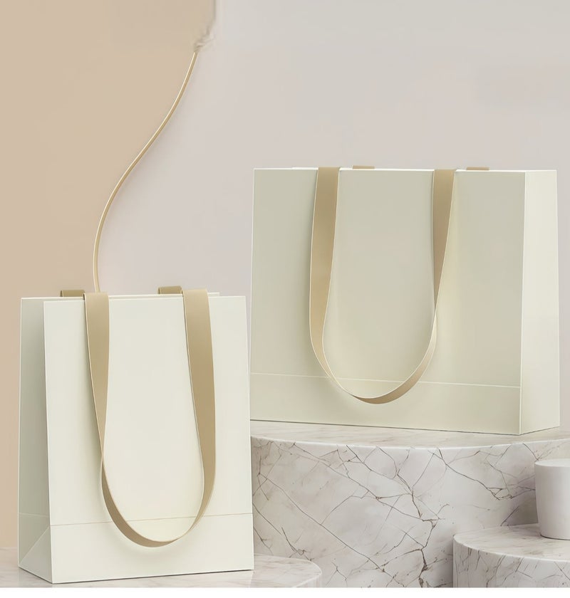 عالم البالونات عبوة من 10 أكياس هدايا ورقية بمقابض، أكياس تغليف هدايا، بالجملة، أكياس هدايا للحفلات، أكياس ورقية للتسوق من متاجر المواد الغذائية، أكياس هدايا لحفلات الزفاف وأعياد الميلاد وحفلات الكريسماس، أكياس حرفية لتجارة المواد الغذائية 21×11×27 سم - Image 1