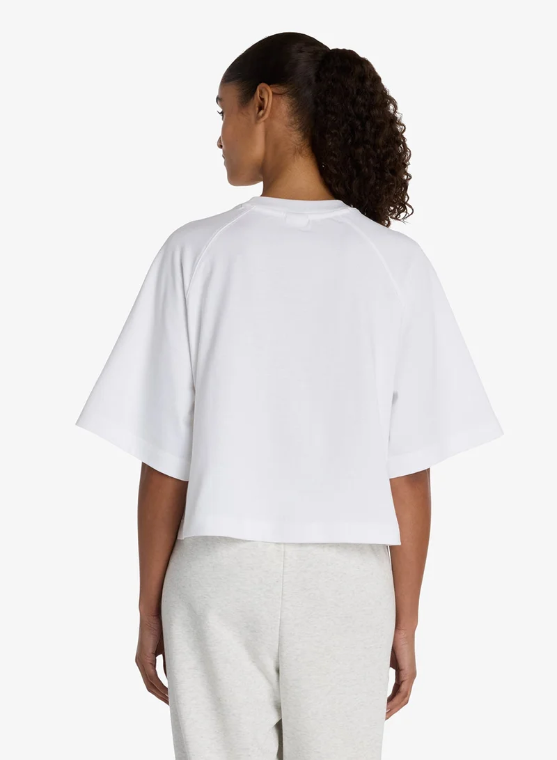 New Balance  Watercolor Yellow Boxy T-Shirt for Women | Best Price UAE