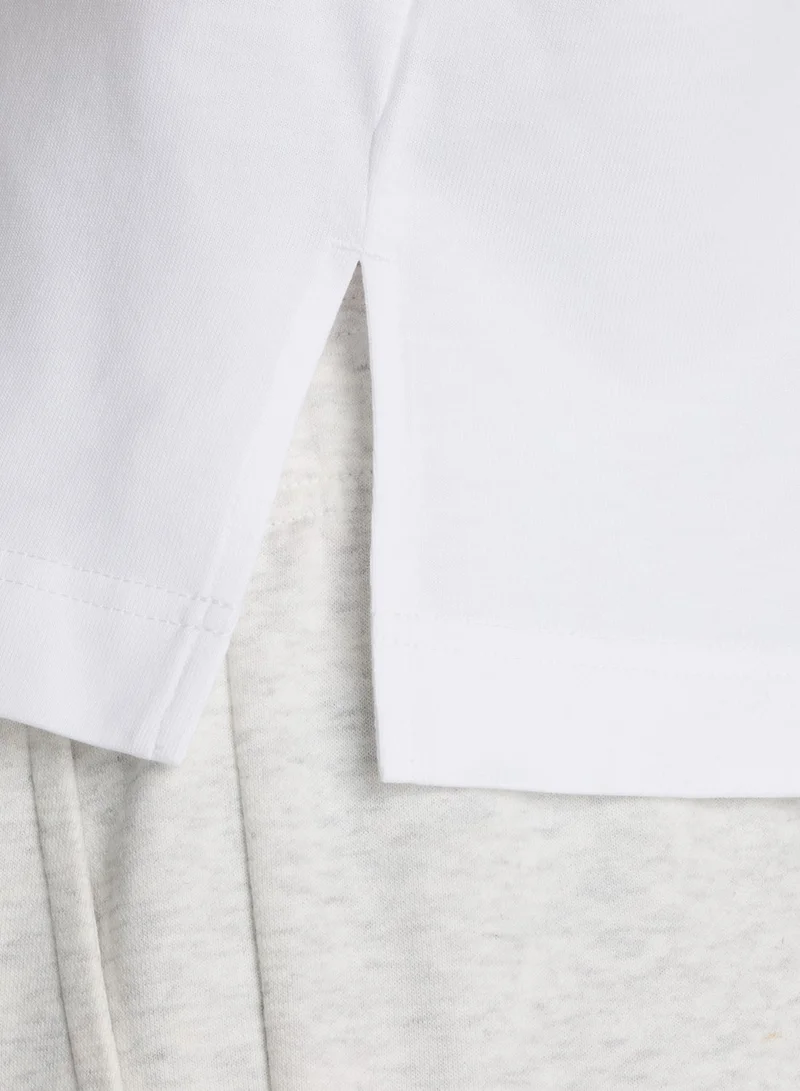 New Balance  Watercolor Yellow Boxy T-Shirt for Women | Best Price UAE