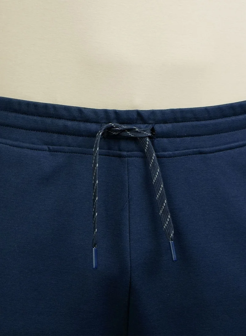 GIORDANO  Men's Slim Tapered Fit Jogger Pants for Men | Best Price UAE