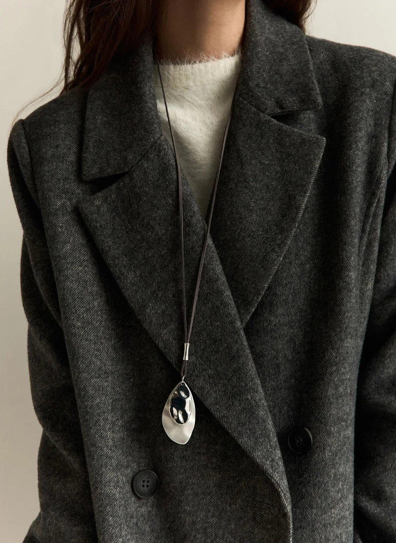 Lace necklace with metal pendants