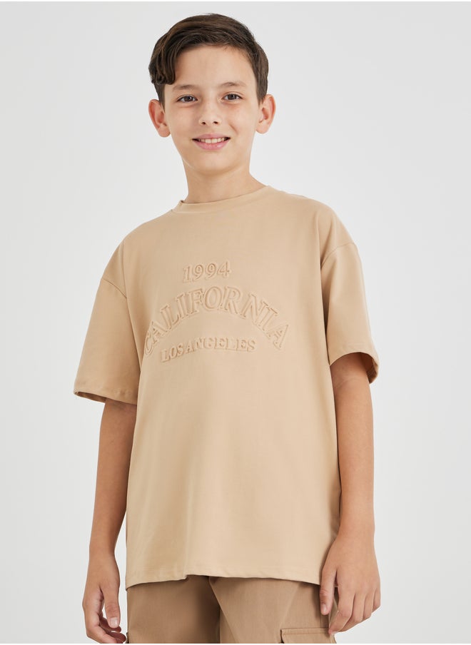 Styli Teen Boys Over Size t-shirt with Embossed print  - Image 1