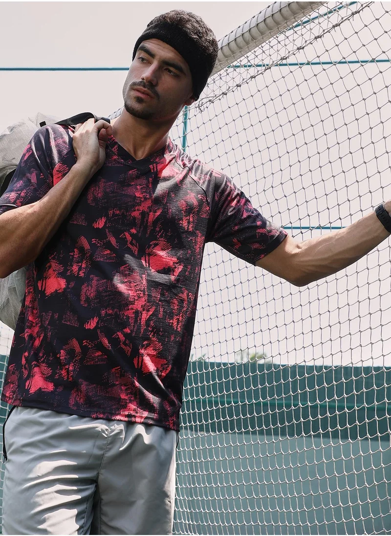 Campus Sutra Campus Sutra Men's Scarelet Red & Midnight Black Abstract-Imprint Activewear T-Shirt For Casual Wear | V-Neck | Short Sleeves | Jersey T-Shirt Crafted With Comfort Fit For Everyday Wear