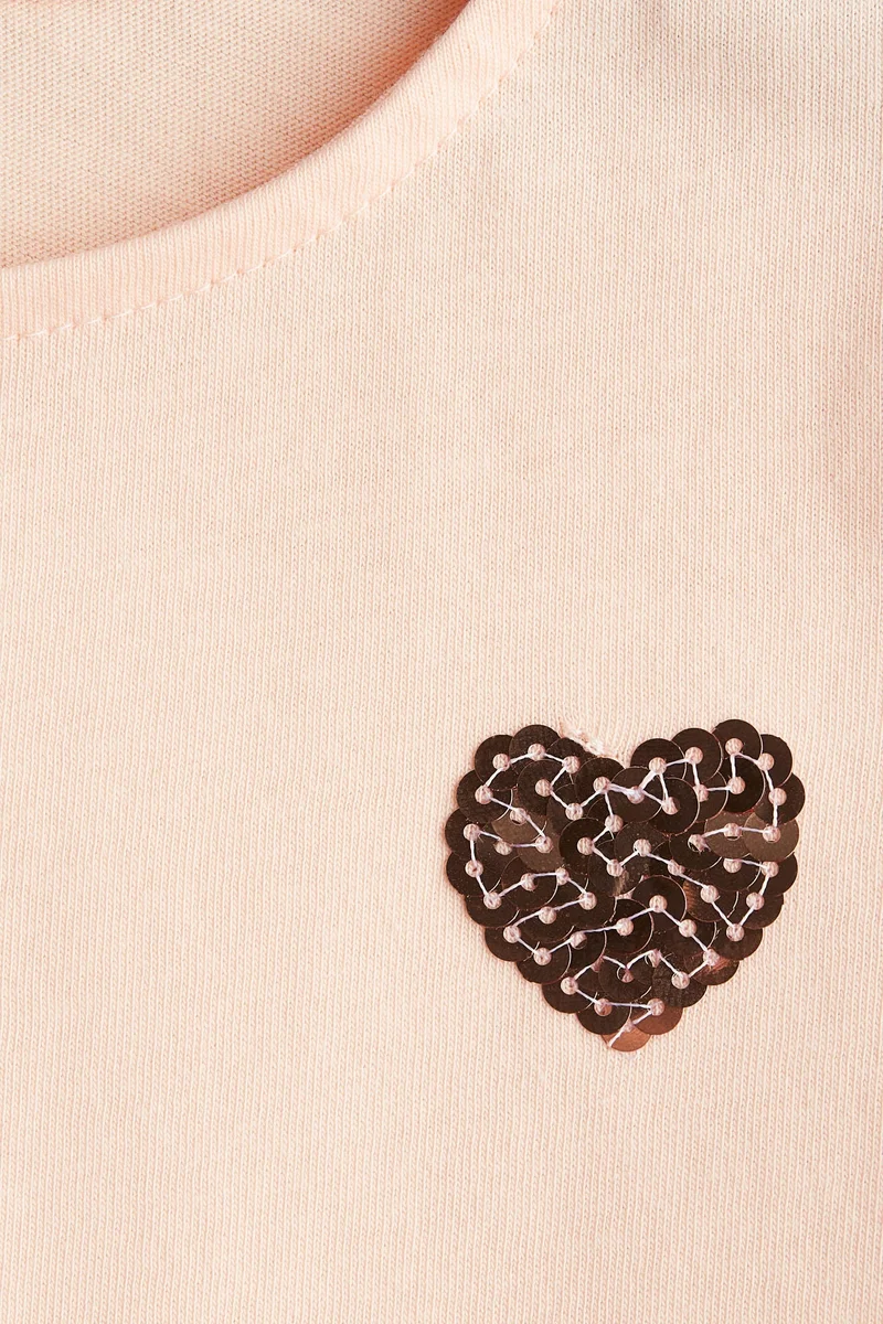 اتش اند ام بلوزة مزينة بترتر لامع