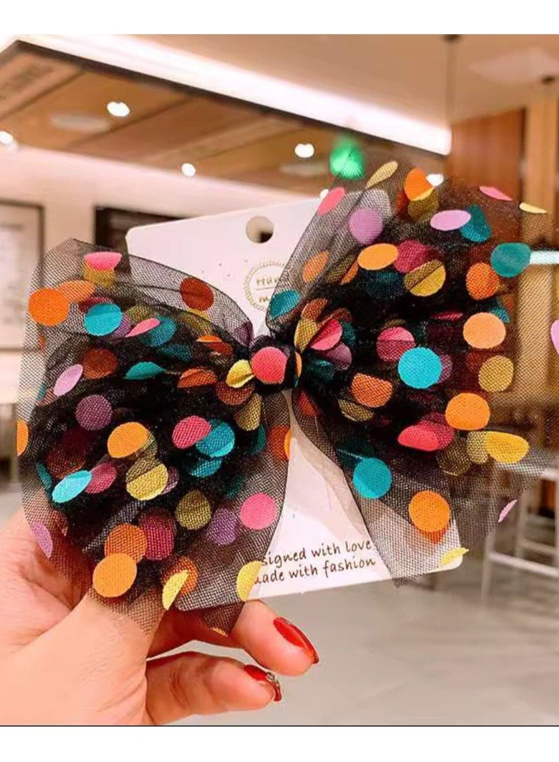 A unique beak headband designed with transparent chiffon adorned with vibrant colored dots, adding a playful and attractive touch to your look. Light, practical, and easy to attach to hair, it is suitable for girls of all ages and complements any look, whether casual or for special occasions. - Image 1