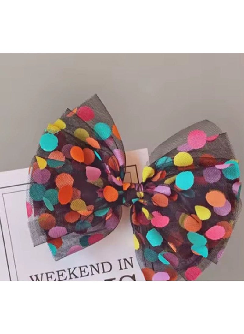 A unique beak headband designed with transparent chiffon adorned with vibrant colored dots, adding a playful and attractive touch to your look. Light, practical, and easy to attach to hair, it is suitable for girls of all ages and complements any look, whether casual or for special occasions. - Image 3