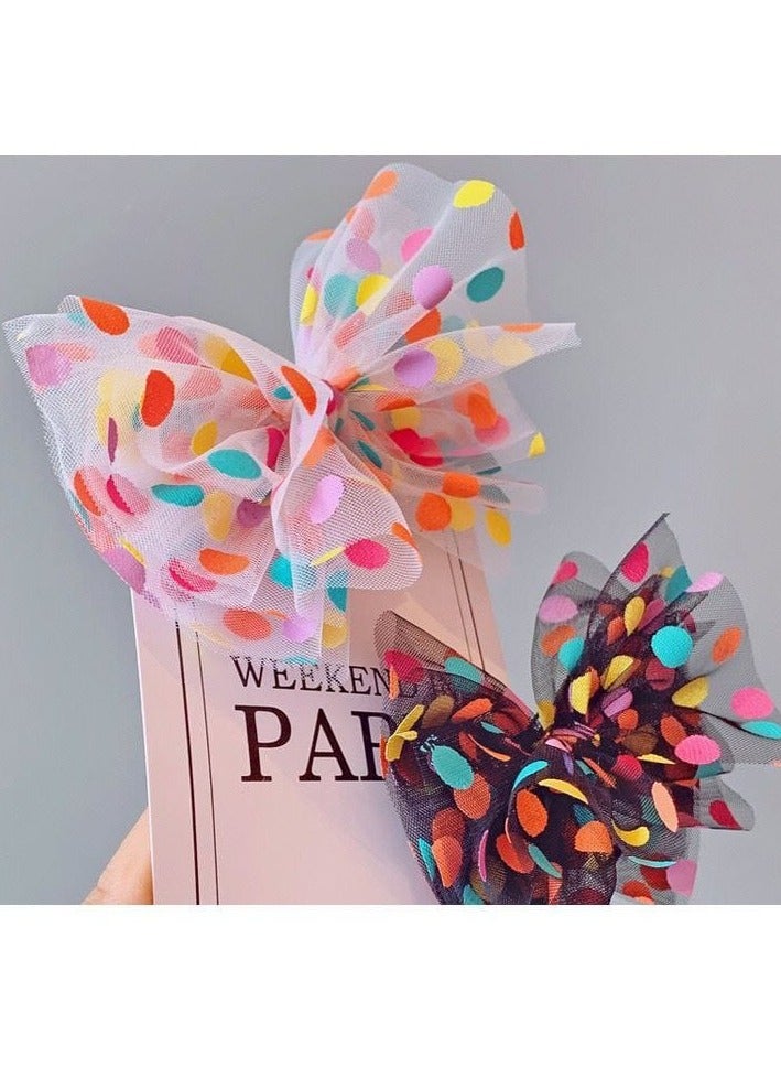 A unique beak headband designed with transparent chiffon adorned with vibrant colored dots, adding a playful and attractive touch to your look. Light, practical, and easy to attach to hair, it is suitable for girls of all ages and complements any look, whether casual or for special occasions. - Image 4