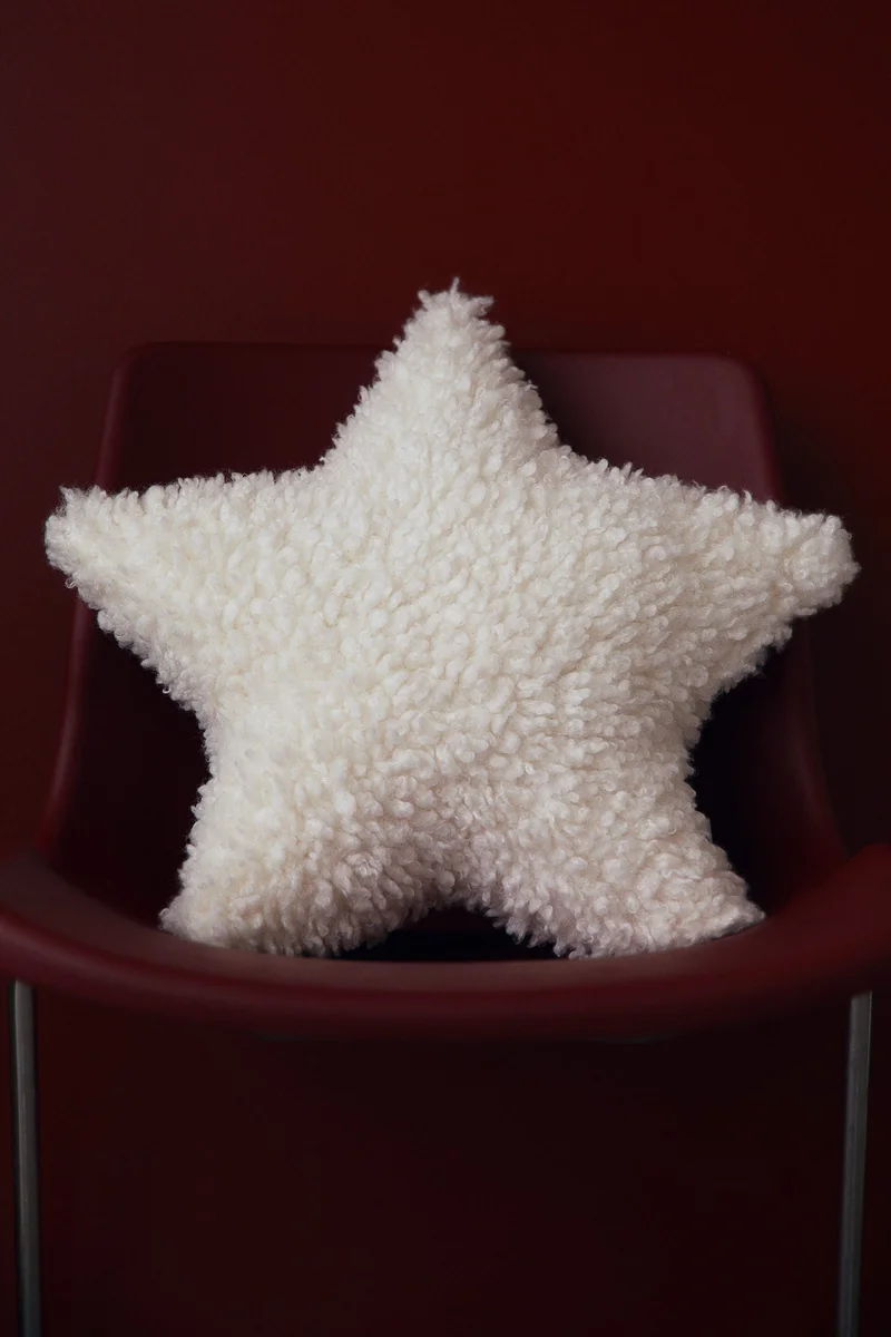 H&M Star-shaped pile cushion