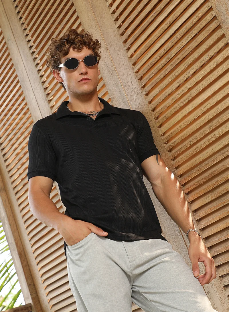Campus Sutra Campus Sutra Men's Onyx Black Ribbed -Tactile Polo T-Shirt For Casual Wear | Polo Neck | Short Cuffed Sleeves | Half-Button Closure | T-Shirt Crafted With Comfort Fit For Everyday Wear