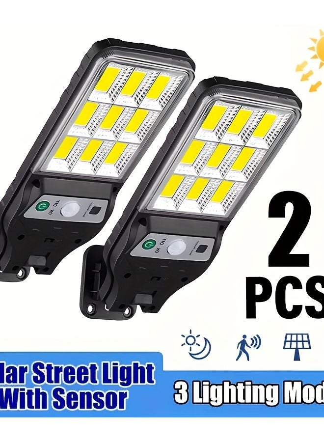 قطعتان من مصابيح الحائط الشمسية للخارج، مصابيح ليد قابلة لإعادة الشحن مع حساس حركة للأمان - Image 1