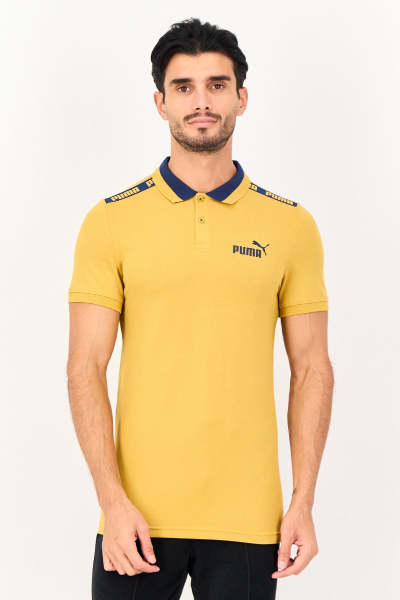 PUMA Men Slim Fit Short Sleeve Outdoor Polo Shirt, Mustard - Image 1