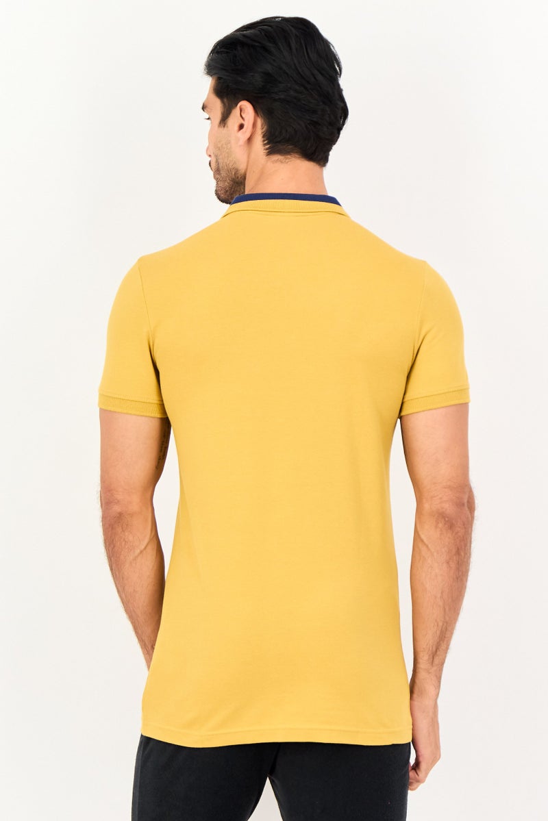 PUMA Men Slim Fit Short Sleeve Outdoor Polo Shirt, Mustard - Image 2