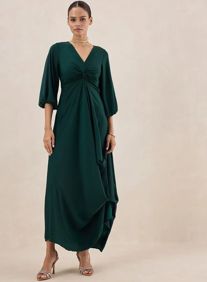 FEMELLA Satin Front Twisted Maxi Dress by Styli