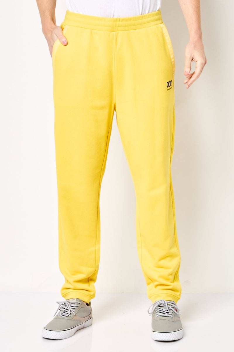 DKNY Men Regular Fit Brand Logo Sweatpants, Yellow - Image 1