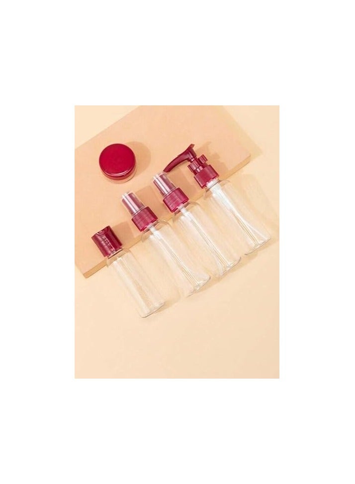 5-piece burgundy travel and cosmetic bottle set. - Image 1
