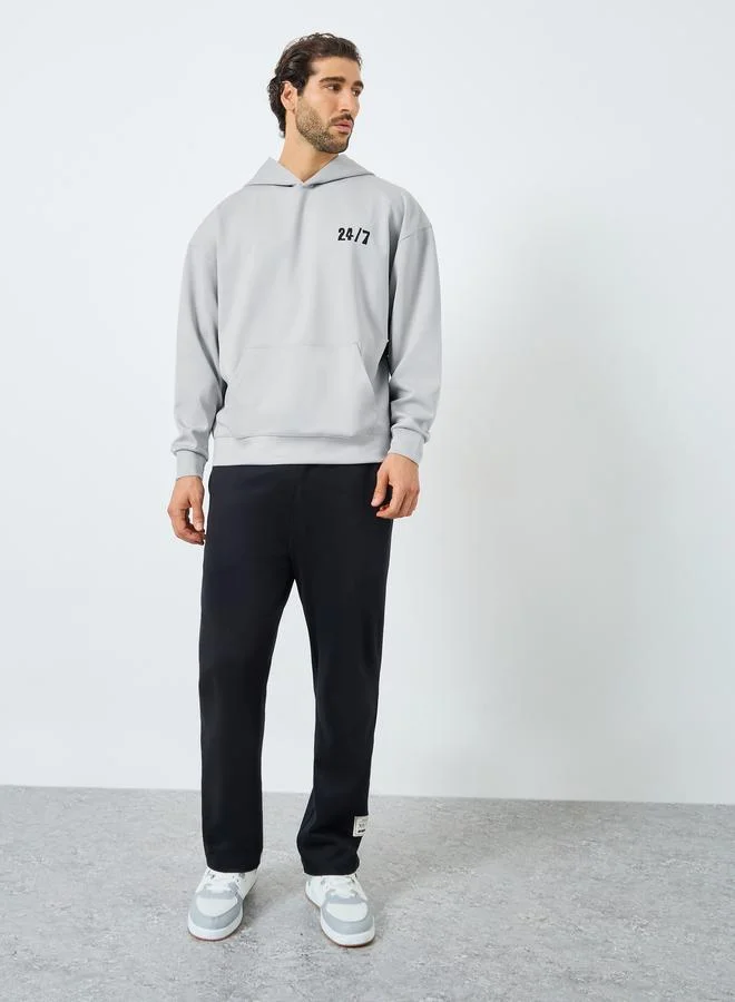 ستايلي هودي رمادي واسع بطبعة خلفية