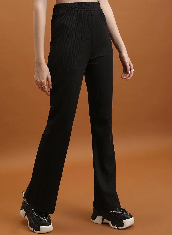 طوكيو توكيز Mid Rise Ribbed Flared Pants by Styli