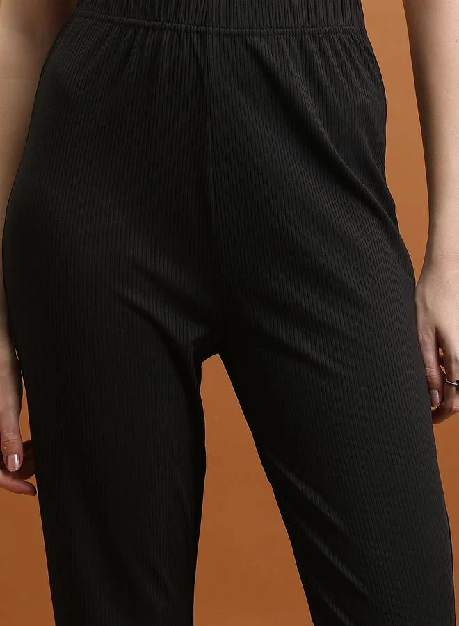طوكيو توكيز Mid Rise Ribbed Flared Pants by Styli