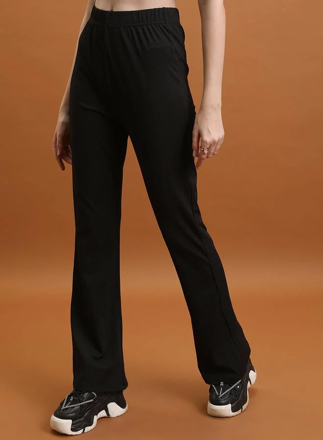 طوكيو توكيز Mid Rise Ribbed Flared Pants by Styli