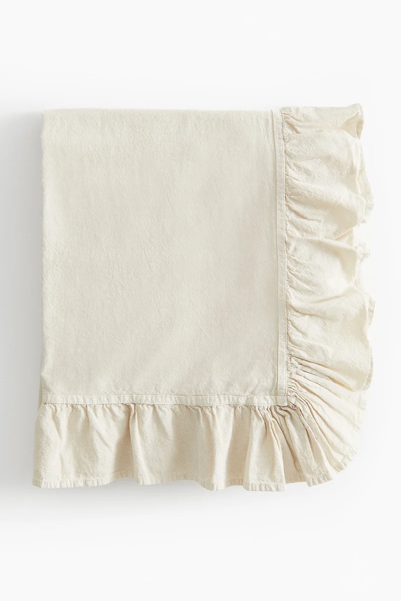 H&M Frill-trimmed tablecloth