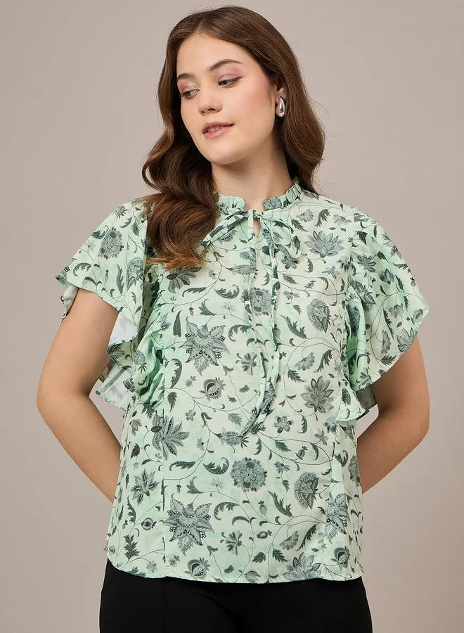 كواري بلوزة بطبعة زهور مع أكمام بكشكش