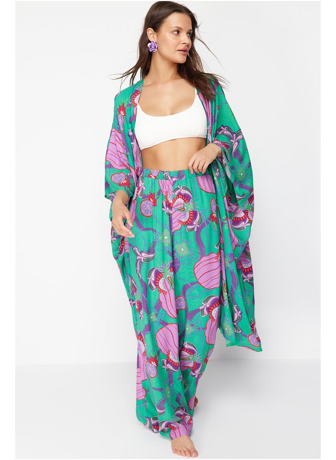 trendyol - بنطلون منسوج بنقوش عرقية TBESS24PL00018 - Image 1