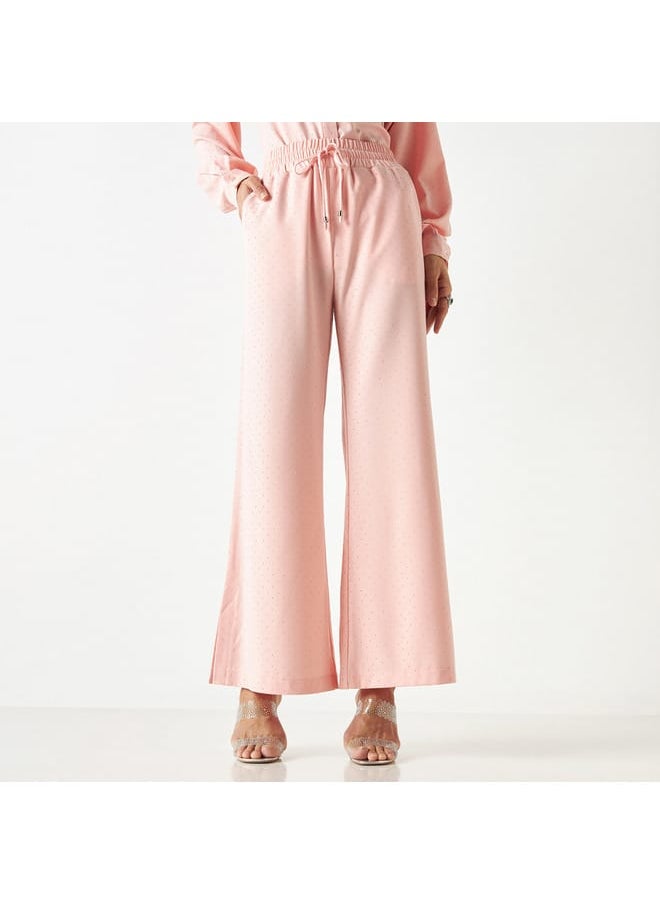 Iconic Iconic All-Over Embellished Flared Leg Pants with Elasticated Waistband and Pockets  - Image 1