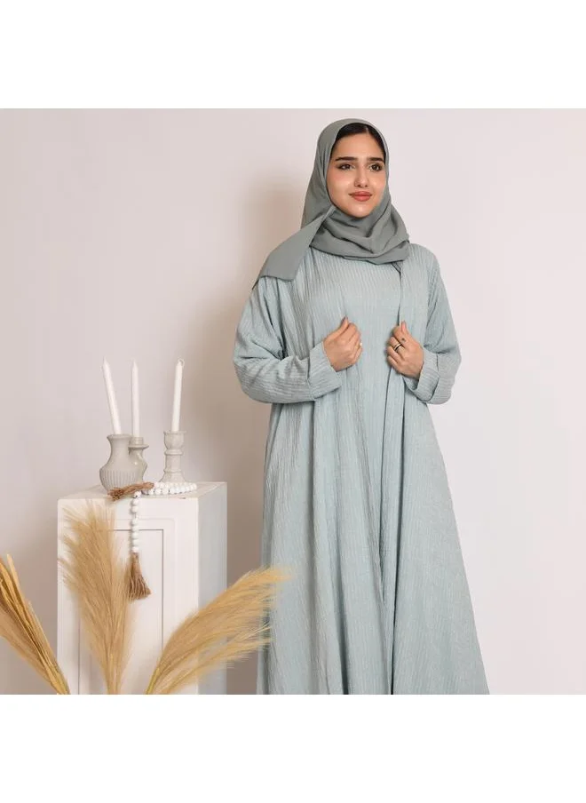 HAWRAA ABAYA Tiffany-colored quarter-cloche wrap abaya with striped fabric and set dress