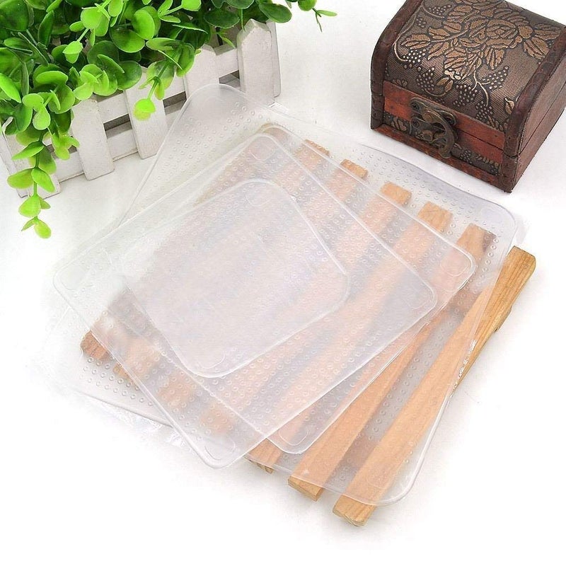 Moolten 4pcs Silicone Reusable Food Wraps Seal Cover Set Keeps Food Fresh - Image 1