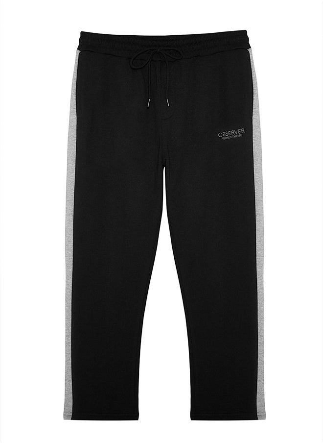 trendyol - Black Men's Regular/Regular Cut Contrast Color Paneled Bold Text with Embroidered Regular Leg Sweatpants. - Image 1