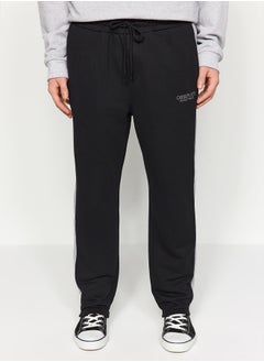 Black Men's Regular/Regular Cut Contrast Color Paneled Bold Text with Embroidered Regular Leg Sweatpants.
